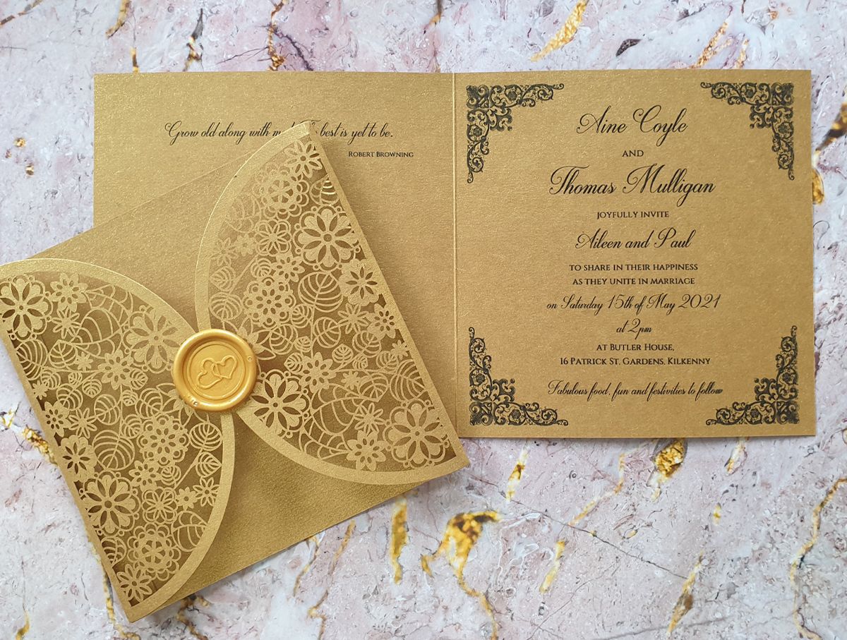 Elegant gold laser cut wedding invitation
