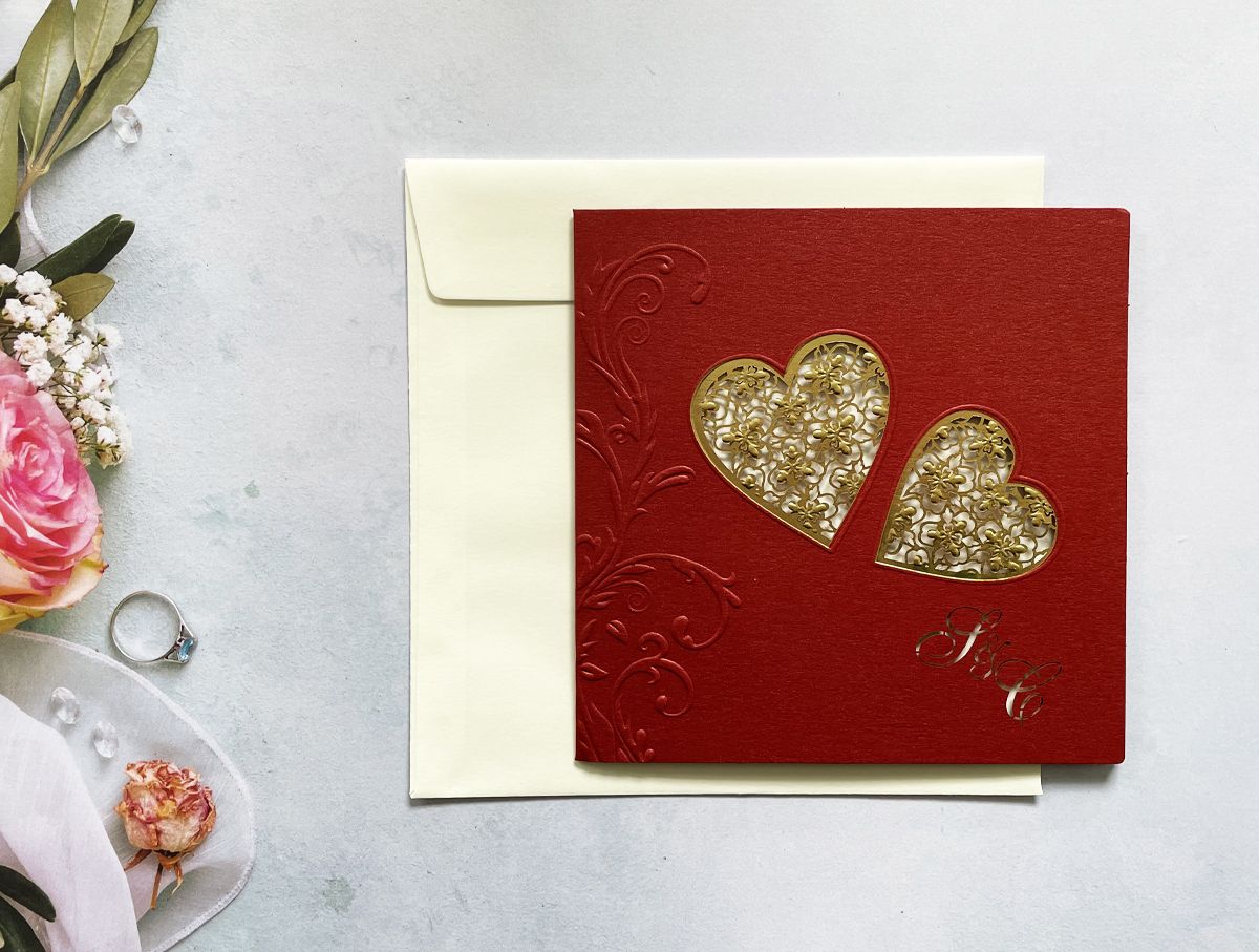 red wedding invitation with hearts