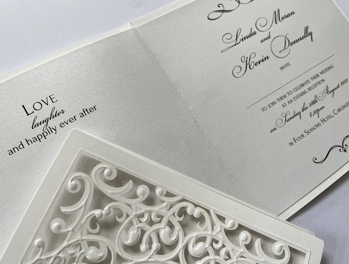 beautiful white wedding invitation
