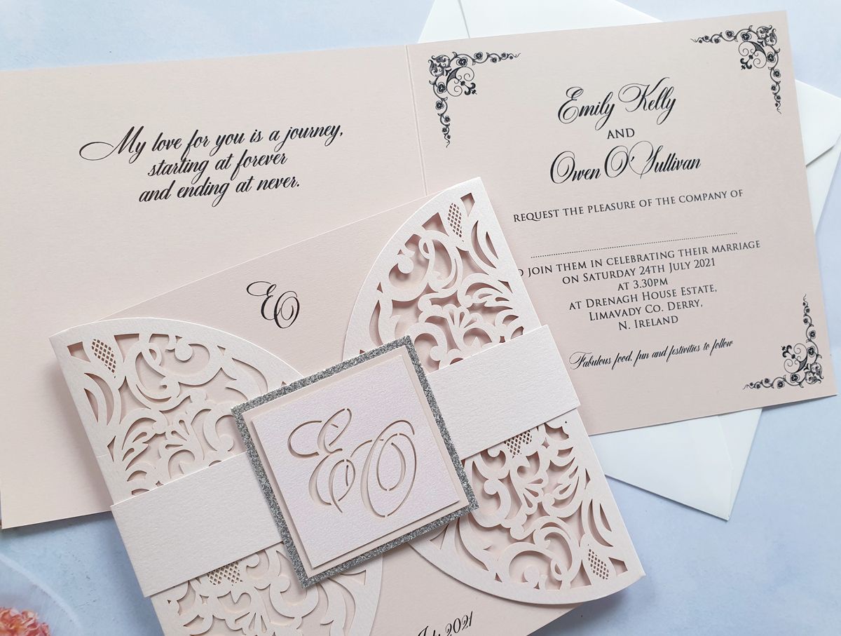 blush pink laser cut wedding invitation